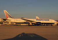 Filename=TRANSAERO_777-200_EI-UNW_MIA_0111B_JP_small.jpg
Filesize=139KiB
Dimensions=1000x695
Date added=Jan 26, 2012 TRANSAERO_777-200_EI-UNW_MIA_0111B_JP_small.jpg