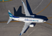 WESTJET_737-700_C-GWSE_LAX_1115A_JP_small.jpg